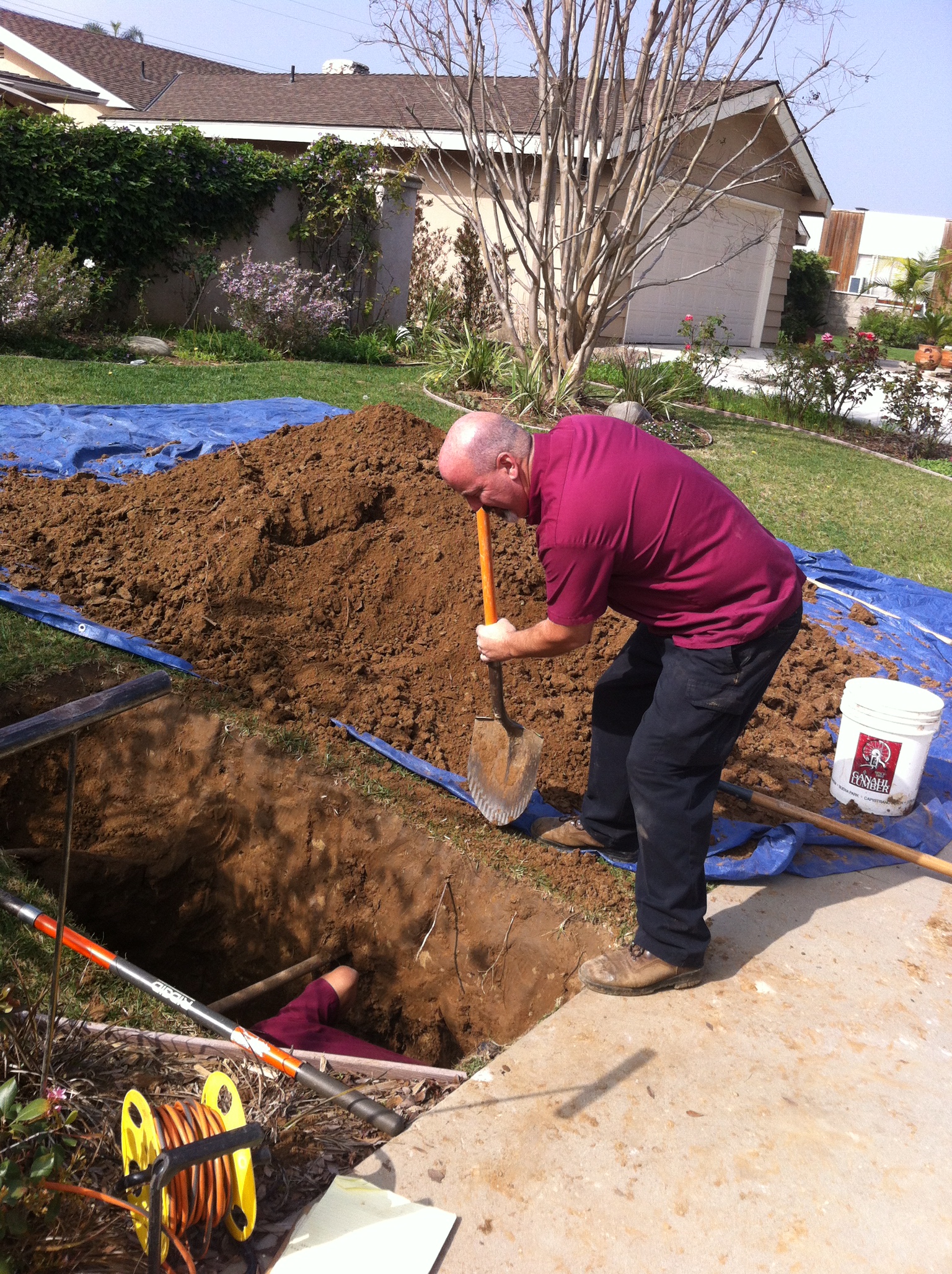 Picture of men digging holes